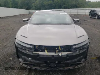 2023 Lucid Air Touring z VIN 50EA1TEA0PA001802, wystawiony jako Copart lot #66840374 z przebiegiem Nie podano mil oraz Szkody całkowita. Historia ofert i sprzedaży dostępna na DreamBid. Obrazek 5.