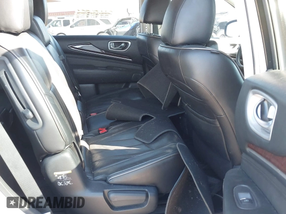 2015 Infiniti QX60 with VIN 5N1AL0MN7FC553099, listed as a IAAI auction lot 42094321 with 100,023 mi miles and . Bid and sale history available at DreamBid. Image 8.