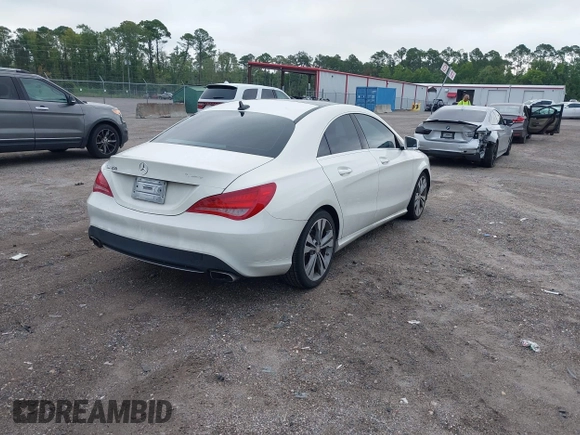 2014 Mercedes-Benz CLA 250 with VIN WDDSJ4EBXEN052730, listed as a IAAI auction lot 42653232 with 152,303 mi miles and . Bid and sale history available at DreamBid. Image 4.