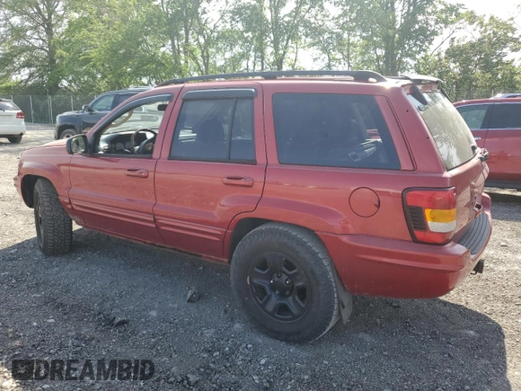 2002 Jeep Grand Cherokee Limited with VIN 1J4GW58N82C182603, listed as a Copart auction lot 57464295 with 240,179 mi miles and Salvage title. Bid and sale history available at DreamBid. Image 2.