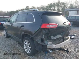 2014 Jeep Cherokee Latitude with VIN 1C4PJMCS7EW180565, listed as a IAAI auction lot 41770555 with 175,629 mi miles and . Bid and sale history available at DreamBid. Image 3.