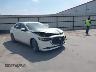 2021 Mazda 3 Select with VIN JM1BPABL0M1317620, listed as a IAAI auction lot 42261666 with 72,778 mi miles and . Bid and sale history available at DreamBid. Image 1.