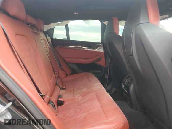 2021 BMW X4 M z VIN 5YMUJ0C08M9G61703, wystawiony jako Copart lot #78197533 z przebiegiem Nie podano mil oraz . Historia ofert i sprzedaży dostępna na DreamBid. Obrazek 11.