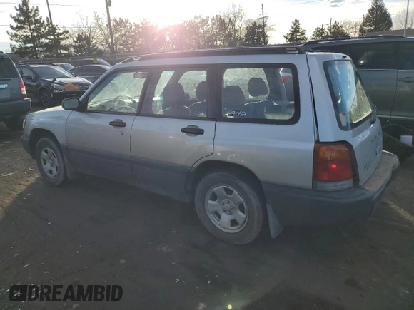 1999 Subaru Forester L with VIN JF1SF6355XG739180, listed as a Copart auction lot 84467674 with 127,591 mi miles and Salvage Title. Bid and sale history available at carsss.com. Image 2.