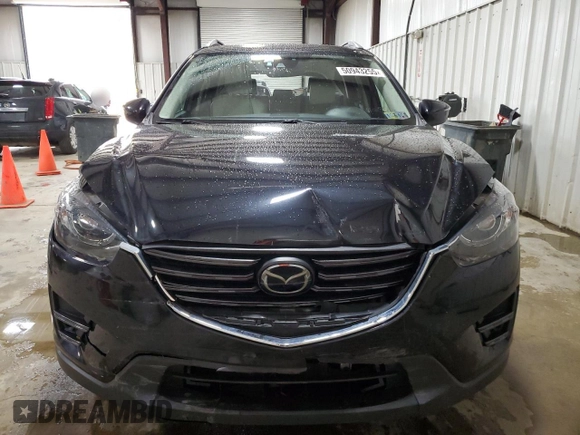 2016 Mazda CX-5 Grand Touring with VIN JM3KE4DY2G0738899, listed as a Copart auction lot 50943255 with 80,807 mi miles and Salvage Title. Bid and sale history available at carsss.com. Image 5.