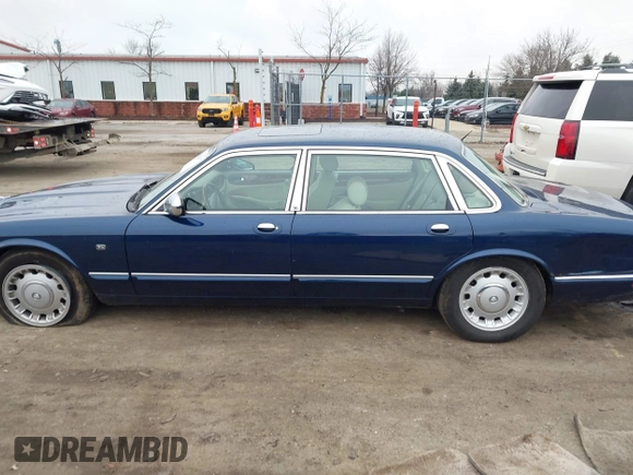 1998 Jaguar XJ Vanden Plas with VIN SAJKX6246WC832202, listed as a IAAI auction lot 41218807 with 96,589 mi miles and . Bid and sale history available at DreamBid. Image 14.