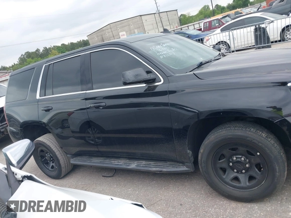 2018 Chevrolet Tahoe Commercial z VIN 1GNLCDEC6JR204921, wystawiony jako IAAI lot #42039630 z przebiegiem 96 008 mil mil oraz . Historia ofert i sprzedaży dostępna na DreamBid. Obrazek 13.