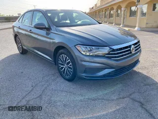 2021 Volkswagen Jetta S z VIN 3VWC57BU2MM046534, wystawiony jako Copart lot #57186455 z przebiegiem 119 912 mil mil oraz Czysty tytuł • Clean title. Historia ofert i sprzedaży dostępna na DreamBid. Obrazek 1.