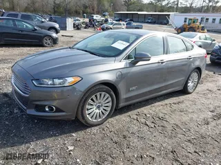 2014 Ford Fusion Energi Titanium with VIN 3FA6P0SUXER216960, listed as a IAAI auction lot 41339413 with 85,025 mi miles. Bid and sale history available at carsss.com. Image 18.