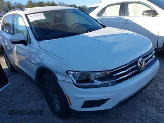 2020 Volkswagen Tiguan S with VIN 3VV0B7AX1LM155996, listed as a IAAI auction lot 41632155 with 76,000 mi miles and . Bid and sale history available at DreamBid. Image 1.