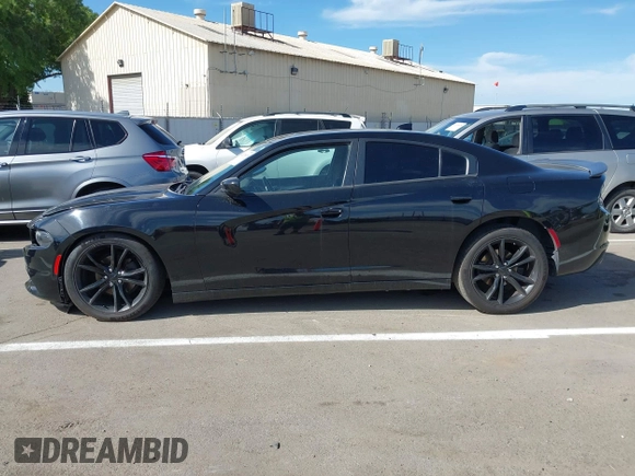 2016 Dodge Charger SXT with VIN 2C3CDXHG6GH146764, listed as a IAAI auction lot 42020618 with 154,693 mi miles and . Bid and sale history available at carsss.com. Image 14.