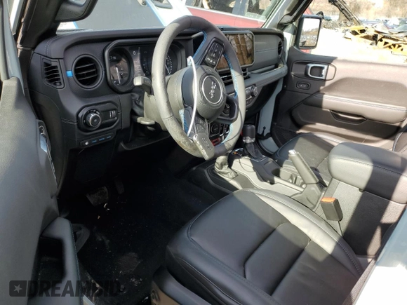 2024 Jeep Wrangler Rubicon with VIN 1C4RJXR61RW255979, listed as a Copart auction lot 43451095 with 7,258 mi miles and Salvage title. Bid and sale history available at DreamBid. Image 8.
