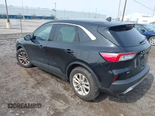 2020 Ford Escape SE with VIN 1FMCU0G67LUB94143, listed as a IAAI auction lot 42033681 with 34,180 mi miles and . Bid and sale history available at carsss.com. Image 3.