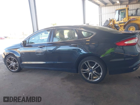 2014 Ford Fusion Titanium with VIN 3FA6P0K97ER328482, listed as a IAAI auction lot 40252350 with 137,128 mi miles. Bid and sale history available at carsss.com. Image 14.