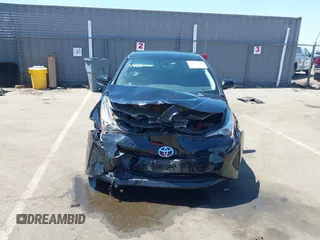 2016 Toyota Prius Four z VIN JTDKARFU7G3017018, wystawiony jako IAAI lot #42224376 z przebiegiem 74 136 mil mil oraz . Historia ofert i sprzedaży dostępna na DreamBid. Obrazek 13.