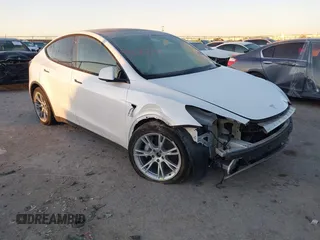 2023 Tesla Model Y Long Range with VIN 7SAYGDEE6PA061228, listed as a IAAI auction lot 41371547 with 25,121 mi miles and . Bid and sale history available at DreamBid. Image 1.