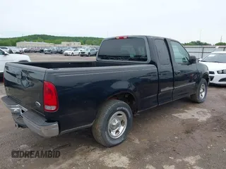 2000 Ford F-150 XL with VIN 1FTRX17L6YKA30614, listed as a IAAI auction lot 42110031 with Not provided miles and . Bid and sale history available at DreamBid. Image 4.