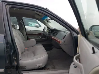 2002 Mercury Grand Marquis LS Premium z VIN 2MEFM75WX2X626520, wystawiony jako IAAI lot #42374203 z przebiegiem 139 692 mil mil oraz . Historia ofert i sprzedaży dostępna na DreamBid. Obrazek 5.