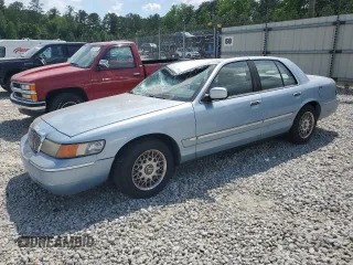 2002 Mercury Grand Marquis GS z VIN 2MEFM74W12X605508, wystawiony jako Copart lot #55296285 z przebiegiem 146 408 mil mil oraz Nie do naprawy • Non repairable. Historia ofert i sprzedaży dostępna na DreamBid. Obrazek 1.