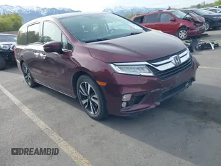 2018 Honda Odyssey Elite z VIN 5FNRL6H94JB067479, wystawiony jako IAAI lot #42100911 z przebiegiem 160 174 mil mil oraz . Historia ofert i sprzedaży dostępna na DreamBid. Obrazek 1.