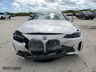 2023 BMW i4 eDrive40 with VIN WBY73AW02PFP79569, listed as a Copart auction lot 70741883 with 9,396 mi miles. Bid and sale history available at carsss.com. Image 5.