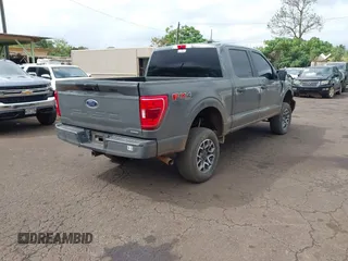 2021 Ford F-150 XL with VIN 1FTEW1EP0MFB94936, listed as a IAAI auction lot 41594393 with 57,033 mi miles. Bid and sale history available at carsss.com. Image 4.