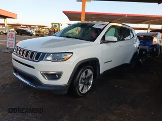 2021 Jeep Compass Limited with VIN 3C4NJCCBXMT559453, listed as a IAAI auction lot 41468643 with 92,963 mi miles. Bid and sale history available at carsss.com. Image 2.