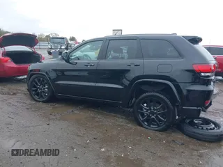 2022 Jeep Grand Cherokee Laredo X with VIN 1C4RJEAG0NC126796, listed as a IAAI auction lot 40755171 with 50,159 mi miles and . Bid and sale history available at DreamBid. Image 14.