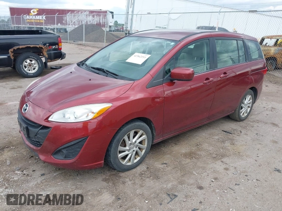 2012 Mazda 5 Sport with VIN JM1CW2BL4C0143780, listed as a IAAI auction lot 42362211 with 201,537 mi miles and . Bid and sale history available at DreamBid. Image 2.