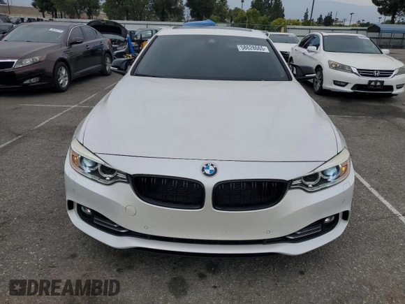 2015 BMW 4 Series 428i xDrive with VIN WBA4C9C59FD331372, listed as a Copart auction lot 58628665 with 81,245 mi miles and Salvage title. Bid and sale history available at DreamBid. Image 5.