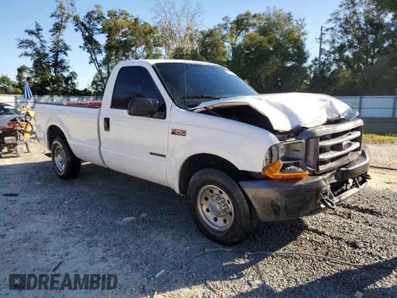2000 Ford Super Duty F-250 XL with VIN 1FTNF20F9YEC91357, listed as a Copart auction lot 76673234 with 318,306 mi miles and Salvage Title. Bid and sale history available at carsss.com. Image 4.