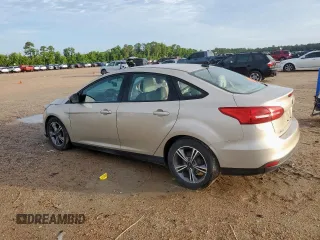 2017 Ford Focus SE with VIN 1FADP3F22HL274842, listed as a Copart auction lot 60970745 with 154,210 mi miles and Salvage title. Bid and sale history available at DreamBid. Image 2.