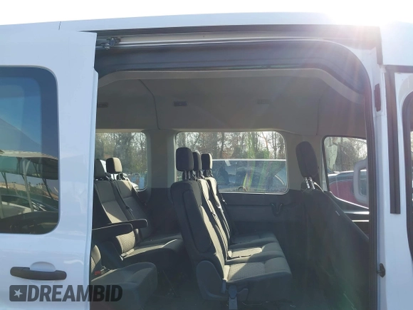 2021 Ford Transit Passenger XL with VIN 1FBAX2C89MKA49631, listed as a IAAI auction lot 41773770 with 77,260 mi miles and . Bid and sale history available at DreamBid. Image 8.