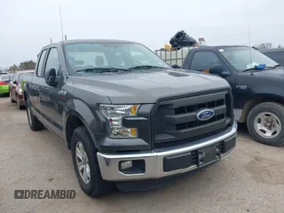 2015 Ford F-150 XL with VIN 1FTEX1CF6FKF02242, listed as a IAAI auction lot 41478528 with 144,197 mi miles. Bid and sale history available at carsss.com. Image 1.
