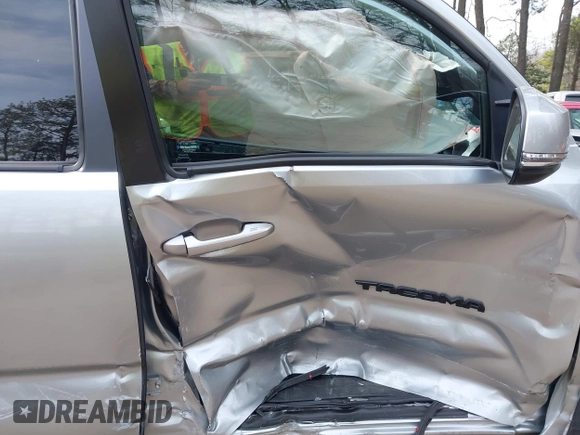 2022 Toyota Tacoma SR with VIN 3TMCZ5ANXNM497511, listed as a IAAI auction lot 41670710 with 26,277 mi miles and . Bid and sale history available at DreamBid. Image 5.