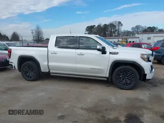 2020 GMC Sierra 1500 Denali z VIN 3GTU9FELXLG371258, wystawiony jako IAAI lot #41303490 z przebiegiem 63 571 mil mil oraz . Historia ofert i sprzedaży dostępna na DreamBid. Obrazek 13.