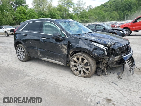 2020 Cadillac XT4 FWD Premium Luxury with VIN 1GYFZCR46LF113499, listed as a Copart auction lot 57534205 with 64,859 mi miles and Salvage title. Bid and sale history available at DreamBid. Image 4.