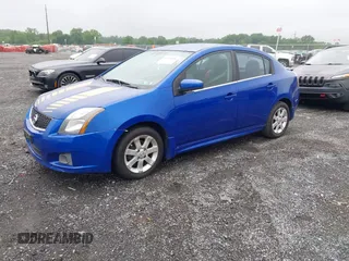2012 Nissan Sentra S with VIN 3N1AB6AP1CL636403, listed as a IAAI auction lot 42523656 with 126,036 mi miles and . Bid and sale history available at DreamBid. Image 2.