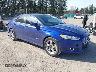 2014 Ford Fusion SE Hybrid with VIN 3FA6P0LU7ER293753, listed as a IAAI auction lot 41968592 with 173,895 mi miles and . Bid and sale history available at DreamBid. Image 1.