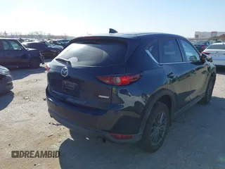 2020 Mazda CX-5 Touring with VIN JM3KFACM0L0780265, listed as a IAAI auction lot 41825873 with 151,888 mi miles. Bid and sale history available at carsss.com. Image 4.