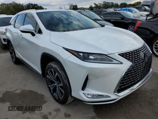 2022 Lexus RX with VIN JTJHZKEA5N2027824, listed as a Copart auction lot 71738562 with 5,100 mi miles. Bid and sale history available at carsss.com. Image 4.