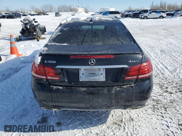 2015 Mercedes-Benz E 400 with VIN WDDKJ6HB8FF299070, listed as a Copart auction lot 46932605 with 133,432 mi miles and Salvage Title. Bid and sale history available at DreamBid. Image 6.
