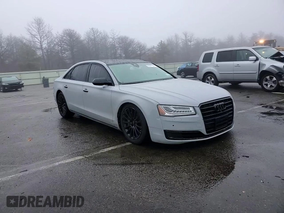 2016 Audi A8 3.0T z VIN WAU34AFD5GN014679, wystawiony jako Copart lot #86691744 z przebiegiem 119 422 mil mil oraz Szkoda całkowita • Salvage title. Historia ofert i sprzedaży dostępna na DreamBid. Obrazek 11.