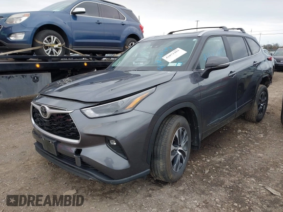 2023 Toyota Highlander L with VIN 5TDKDRBH7PS044010, listed as a IAAI auction lot 42072483 with 21,655 mi miles and . Bid and sale history available at DreamBid. Image 2.