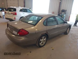 2003 Ford Taurus SES Standard with VIN 1FAFP55293G272187, listed as a IAAI auction lot 42154599 with 225,077 mi miles. Bid and sale history available at carsss.com. Image 4.