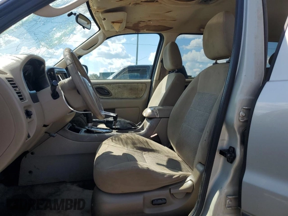 2005 Ford Escape XLT with VIN 1FMYU03115KB27374, listed as a Copart auction lot 72568654 with Not Provided miles and Salvage Title. Bid and sale history available at DreamBid. Image 7.