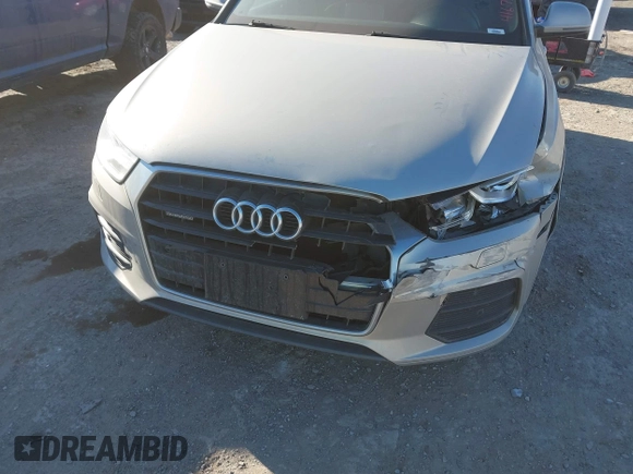 2017 Audi Q3 Premium Plus z VIN WA1JCCFS5HR011907, wystawiony jako IAAI lot #41675496 z przebiegiem 102 591 mil mil oraz . Historia ofert i sprzedaży dostępna na DreamBid. Obrazek 17.