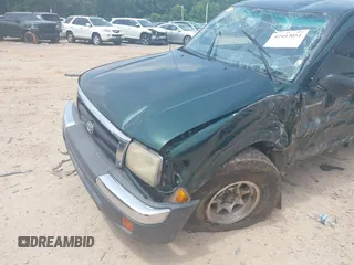 1999 Toyota Tacoma with VIN 4TAWN72N2XZ542053, listed as a IAAI auction lot 42493051 with Not provided miles and . Bid and sale history available at DreamBid. Image 6.