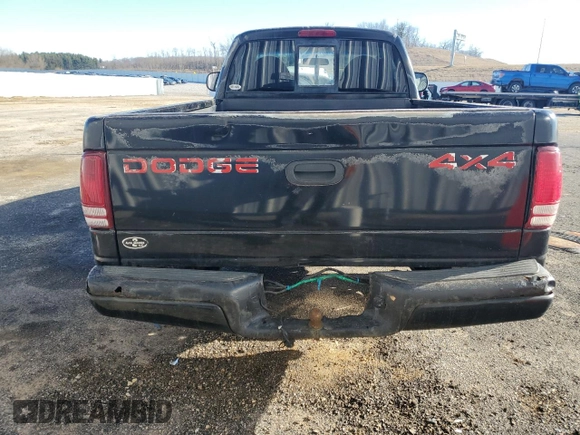 1997 Dodge Dakota z VIN 1B7GG26Y3VS174739, wystawiony jako Copart lot #49969395 z przebiegiem 226 942 mil mil oraz Nie do naprawy • Non repairable. Historia ofert i sprzedaży dostępna na DreamBid. Obrazek 6.
