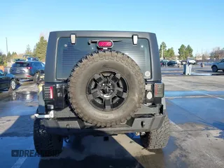 2018 Jeep Wrangler JK Unlimited Sport S with VIN 1C4BJWDG7JL818843, listed as a IAAI auction lot 41506058 with 43,563 mi miles. Bid and sale history available at carsss.com. Image 17.